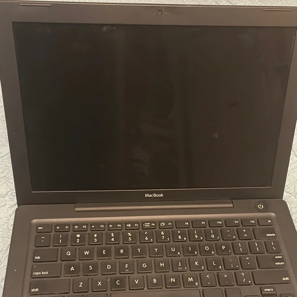 Apple Black Laptop with Sleek Design and Premium Finish